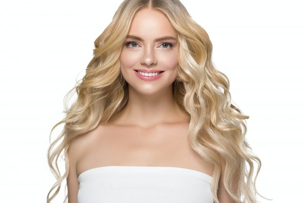 Teeth smile woman face blonde hair natural make up clean beauty healthy skin hait and teeth